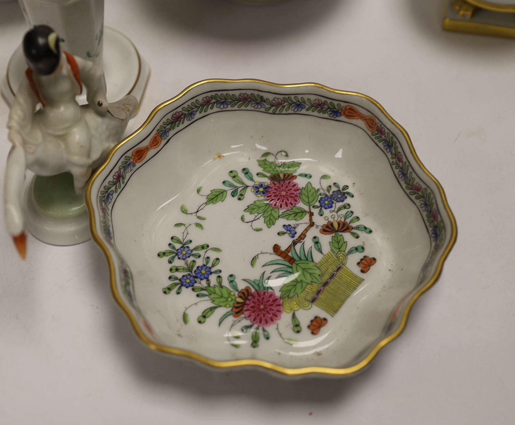 A group of Herend, Hungary porcelain wares including; a covered dish, tray, candlestick, two pedestal vases, boy on a goose, etc. tallest 13cm